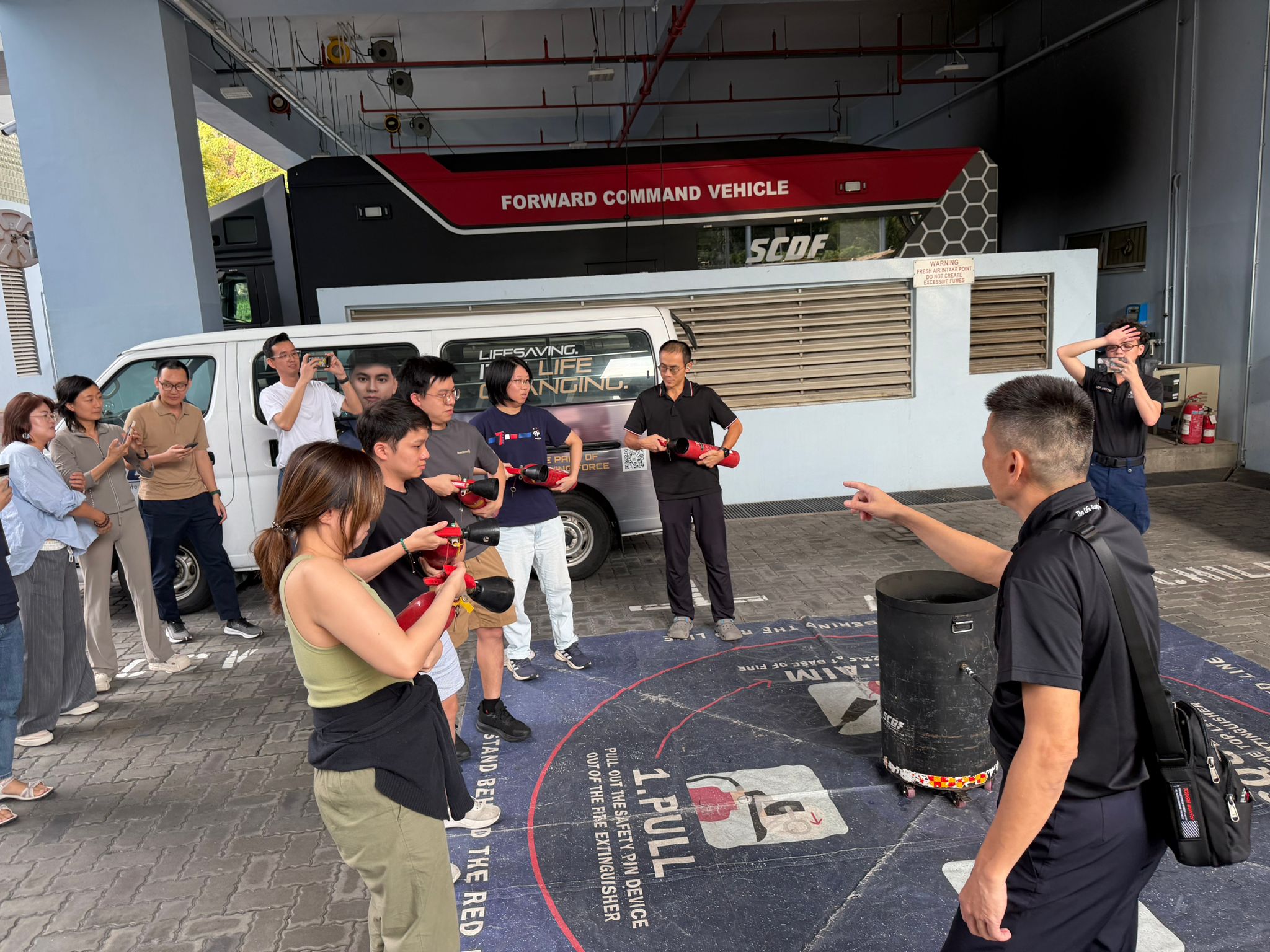 Learning to use a fire extinguisher